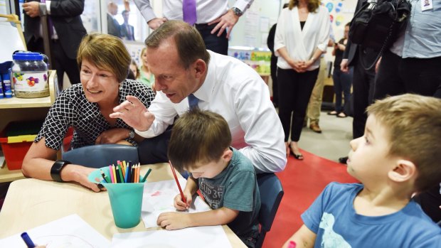 Prime Minister Tony Abbott and wife Margie meet kids at the Little Pines Childcare Centre in Sydney on Tuesday.