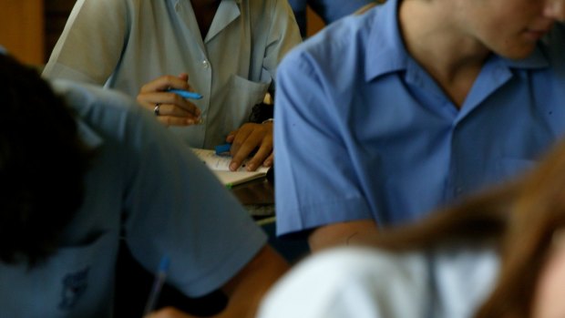 A former Brisbane private school teacher has denied indecently treating children. 