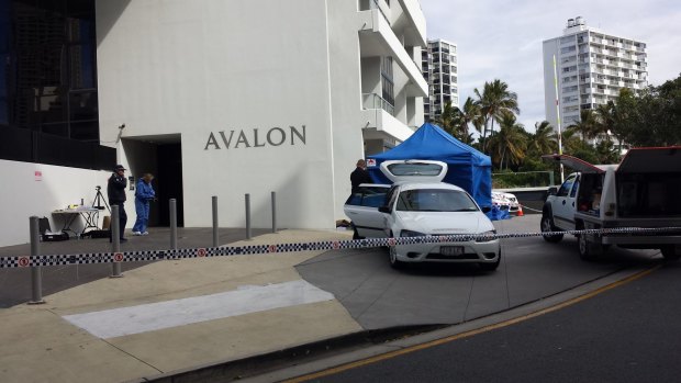 Police investigators at Surfers Paradise's Avalon resort after a woman plunged to her death.