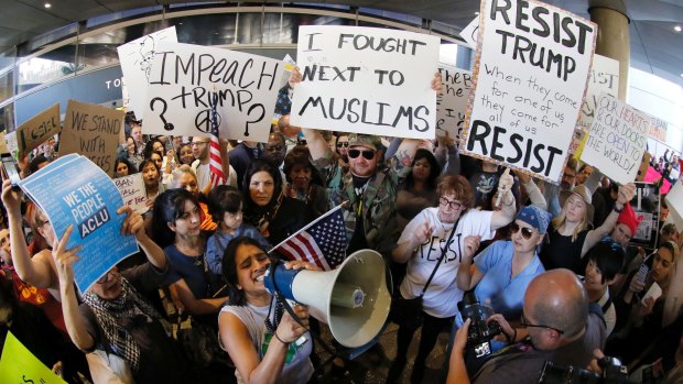 Demonstrators at Los Angeles International Airport in January protest President Trump's travel ban.