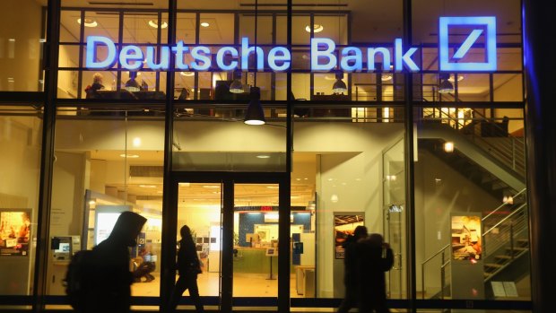 Deutsche Bank's quarterly profit was all but wiped out by the cost of an overhaul. 