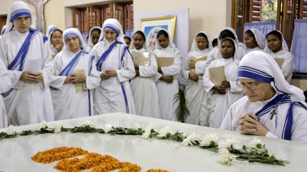 Nuns of Missionaries of Charity, the order founded by Mother Teresa, join in a special mass in relation to her canonisation.