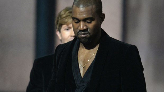 Loser? Kanye disses Beck as he receives the Grammy for Album Of The Year.