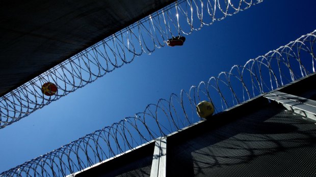 Razor wire tops fences at Lithgow Correctional Centre.