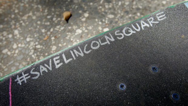 A hashtag on a skateboard at Lincoln Square.
