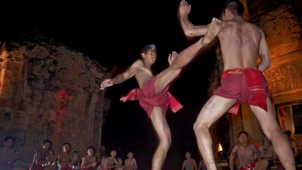 Muay Thai kick boxers at the Sikhoraphum Castle.