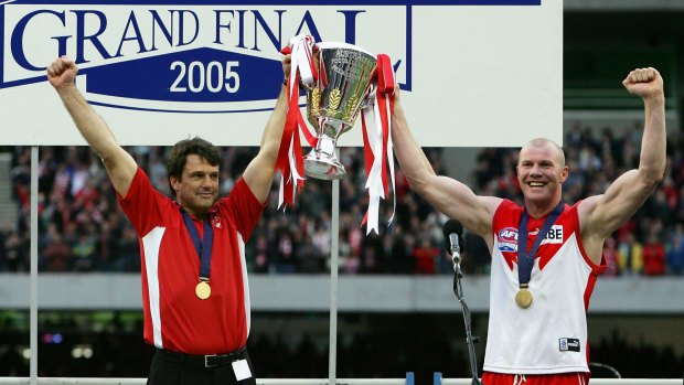 Glory days: Swans coach Paul Roos and captain Barry Hall hold the trophy aloft after the 2005 grand final against the West Coast Eagles at the Melbourne Cricket Ground.