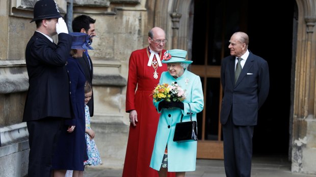 Britain's Queen Elizabeth and Prince Philip leave the Easter Sunday service in Windsor Castle.