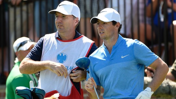 McIlroy with his former caddie, J.P. Fitzgerald.