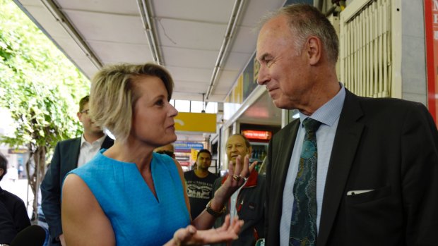 Kristina Keneally challenges John Alexander while he campaigns in Eastwood Mall.