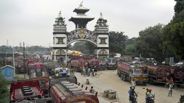 Nepalese oil tankers and commercial trucks stand stranded near a gate in Birgunj that marks Nepal's border with India. India insists it is not blockading the crossing, despite Nepal's protests.