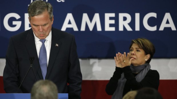 Jeb Bush calls it a day in South Carolina, as his wife Columba applauds.   