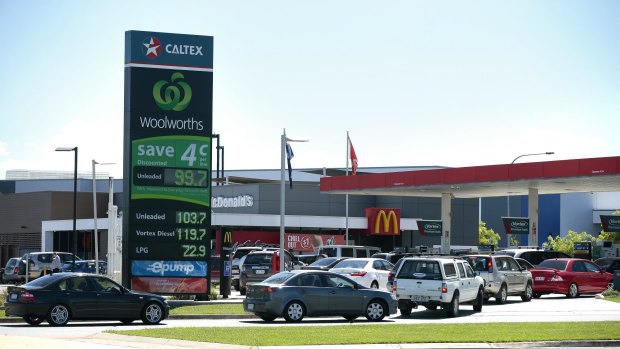 Cars line up for discounted fuel at Caltex/Woolworths Petrol in Majura Park.
