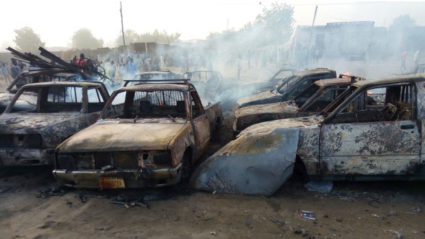 The wreckage after a battle between Boko Haram and Nigerian forces in a Maiduguri car park.