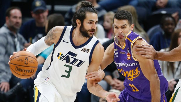 Jazz guard Ricky Rubio and Kings guard Kevin Lisch.
