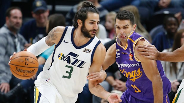 Jazz guard Ricky Rubio and Kings guard Kevin Lisch.