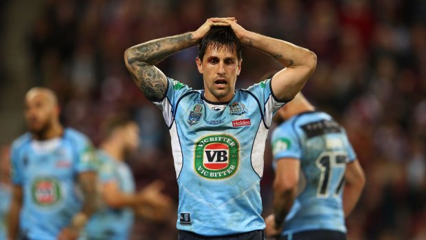 Beaten man: Mitchell Pearce comes to terms with defeat in game three.