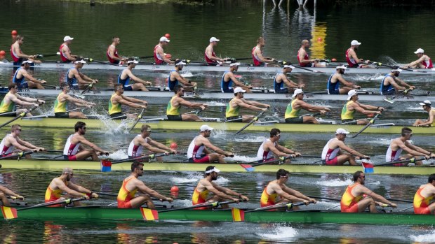 The boats of Spain, USA, Australia, Italy and Poland, from front, start for the men's  eight race at the Rowing Olympic Qualification on Lake Rotsee in Lucerne, Switzerland.