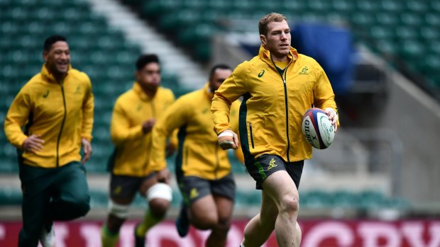 Follow the leader: David Pocock leads the way during the Wallabies captain's run at Twickenham.
