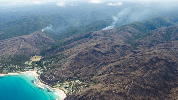 Fires still burn in the hills above Wye River and could cause difficulty for firefighters as the weather worsens later in the week. 