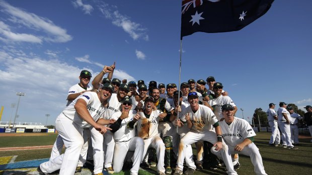 Flying the flag: Australian players celebrate after their victory over South Africa.