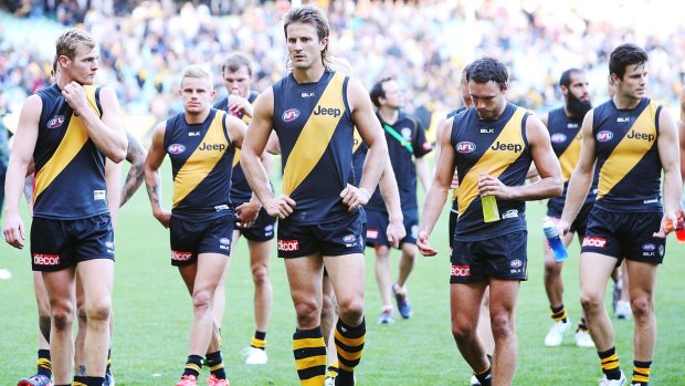 Richmond's Ivan Maric leads teammates off after the round-five defeat against Geelong.