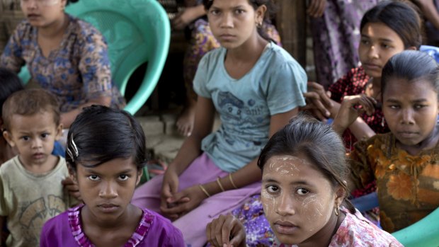 Rohingya girls sit at a refugee camp north of Sittwe in Myanmar last year. 