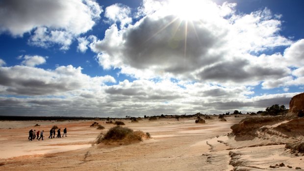 Visitors to Mungo National Park tour the  Walls of China.