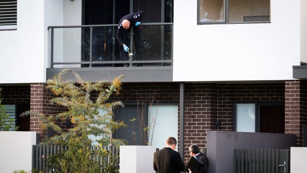 Police search around Stephen Dank's home in Ascot Vale after it was peppered with bullets. 