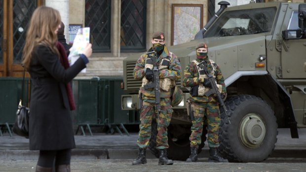 Belgian soldiers patrol in the historic Grand Place in Brussels on Monday.