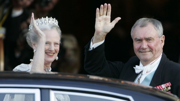 Denmark's Queen Margrethe and Prince Henrik arrive for a gala performance at the Royal Theatre in Copenhagen in 2004.