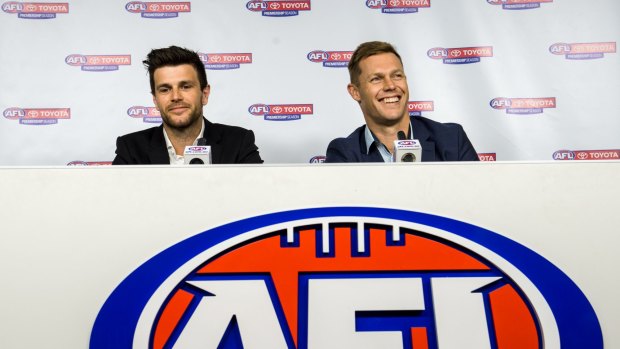 Trent Cotchin and Sam Mitchell at AFL House on Thursday.