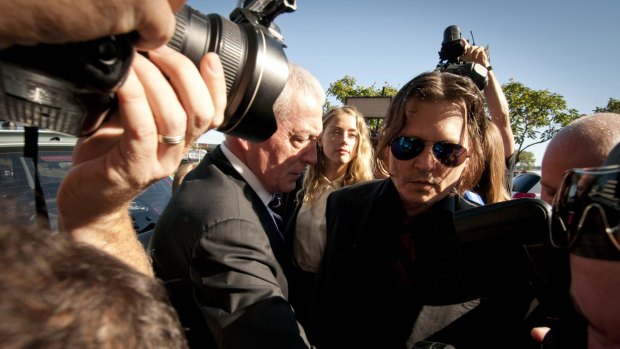 Johnny Depp and Amber Heard outside court.
