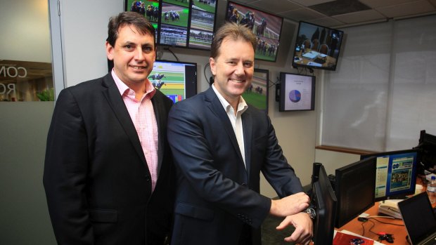 RVL chief steward Terry Bailey and outgoing head of integrity Dayle Brown in the Racing Victoria integrity control room.