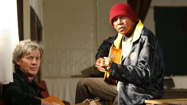 Shane Howard and Archie Roach performing a fundraising concert together.