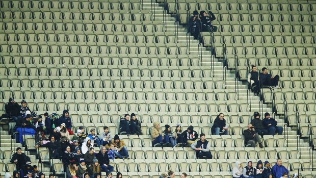 Empty seats at the MCG during an AFL game.