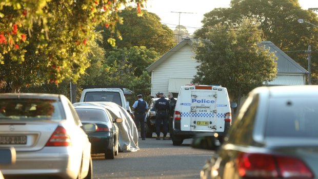 Police attend Mr Nguyen's home on Fitzroy Street in Campsie.