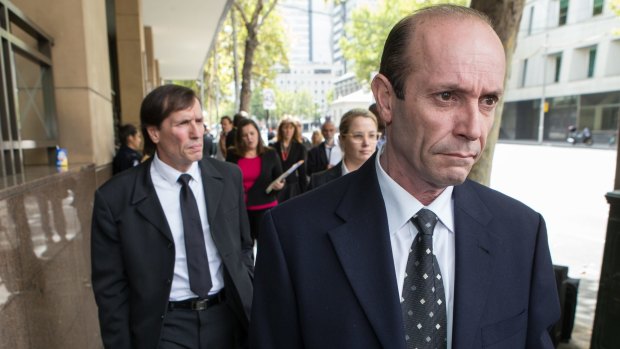 Brothers Chris, front, and Gerry Apostolatos at the Melbourne Magistrates Court on Wednesday.