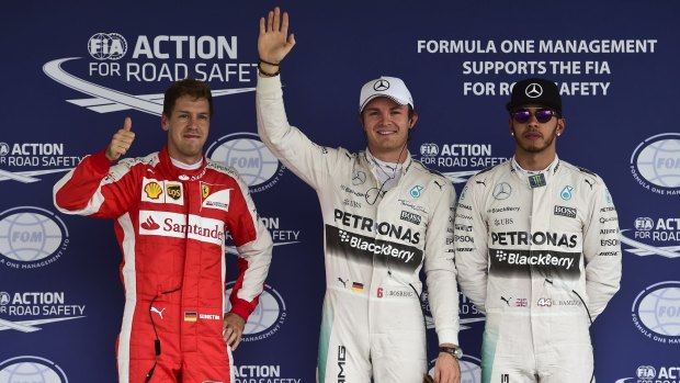 Pole winner Nico Rosberg with Sebastian Vettel and Lewis Hamilton.