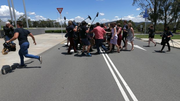 Media attempt to ask question of Senator Ricky Muir on Tuesday.