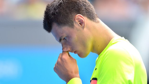 What's going wrong? Tomic tries to work out why he cannot get past Berdych.
