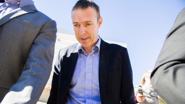 The government's former chief NBN adviser Stephen John Ellis leaves the ACT Magistrates Court in May.