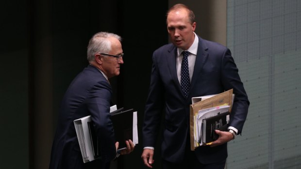 Immigration Minister Peter Dutton, right, hosted a $995-a-head fundraiser attended mostly by developers bidding to build his department's headquarters.