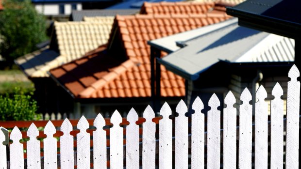 Reserve Bank deputy governor Philip Lowe says families with houses that have risen in value may be saving rather than spending because they want to help their children buy property. 