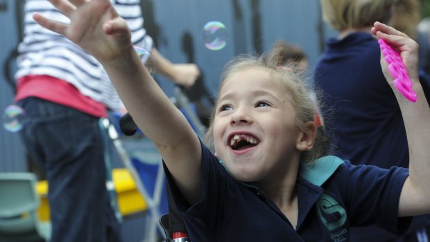 At the opening of the sensory space at Cranleigh School in Holt, Lovina Micallef, 6, is intrigued with the bubble blowing activity. 