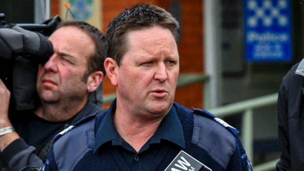 Sergeant Mark Knight addresses the media on Thursday.