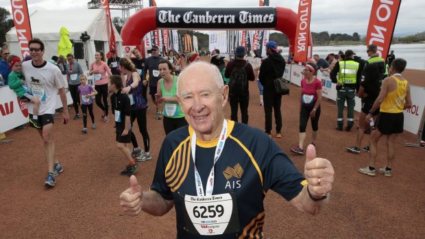 The Canberra Times 2015 Fun Run's oldest competitor, John Beagle, 83, after crossing the finish line.