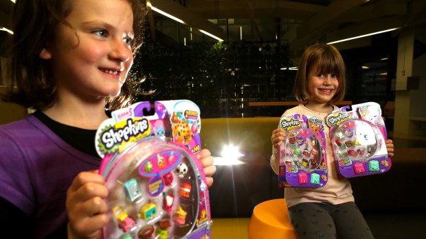 Bridget Lavelle and Sidney Silkstone are seen playing with Shopkins.