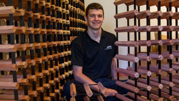 Mathew Childs with his wine storage products.