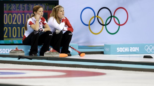 Curling monsters: Canada's Jennifer Jones, right and Kaitlyn Lawes at the Sochi Games.